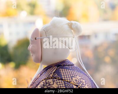 GOMEL, BELARUS - APRIL 20, 2020: The Antique Kimekomi Japanese doll old man Jo depicting a Noh play, 'The Old Couple from Takasago'. Stock Photo