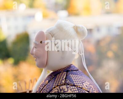 GOMEL, BELARUS - APRIL 20, 2020: The Antique Kimekomi Japanese doll old man Jo depicting a Noh play, 'The Old Couple from Takasago'. Stock Photo