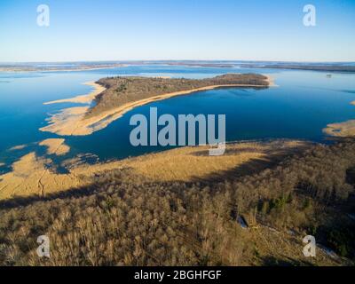 Aerial view of reinforced concrete bunker belonged to Headquarters of German Land Forces from ww2 hidden in a forest on the Mamry Lake shore, Mamerki, Stock Photo