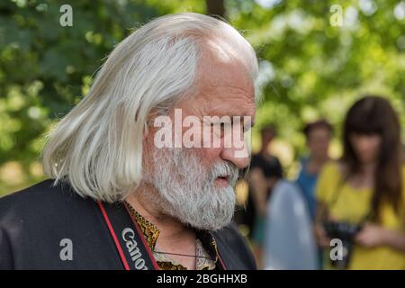 ZAPORIZHZHYA, UKRAINE - JULY 03, 2018: Famous Ukrainian photographer, lecturer, curator of exhibitions, and traveler Yuri Kosin at Ukrainian photograp Stock Photo