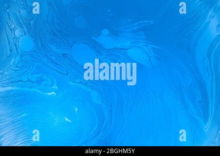 Abstract color background. Bubbles of oil in a colored liquid and lighting in macro photography. Creative and art concept Stock Photo