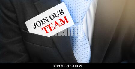 Join our team message on the card in businessman pocket. Job work hiring teamwork hr management concept Stock Photo