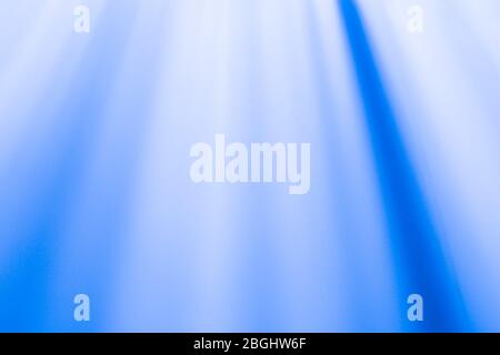 Blurred blue and white light background. Pink rays. Abstract background Stock Photo