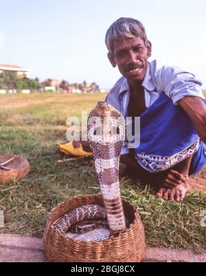 Snakecharmer on Galle Face Green, Galle, Colombo, Southern Province, Sri Lanka Stock Photo