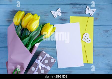 Mock Up Envelope With Yellow Tulips On An Orange Background Stock Photo Alamy