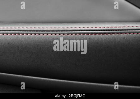 seam on the skin stitched with two parallel lines with red thread Stock Photo