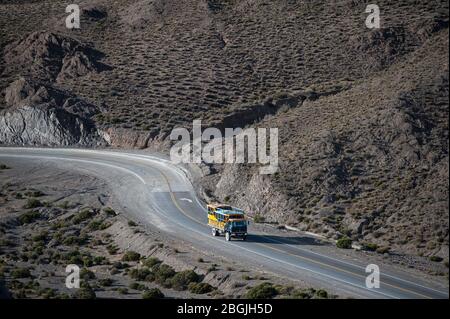 San Antonio de los Cobres, Salta, Argentina - August 31 2012: View of the truck coming back from San Antonio de los Cobres to Salta city and the lands Stock Photo