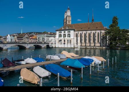 boats parked at pier at lake Lucerne / Switzerland Stock Photo