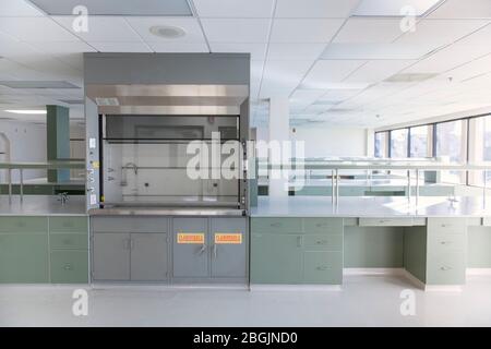 New science lab with hood and green benches Stock Photo