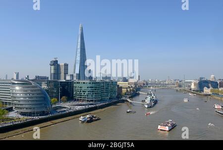 View of the Southwark bank of the river Thames with the Shard and Mayor of London's City Hall office prominent, seen from Tower Bridge. London, UK Stock Photo