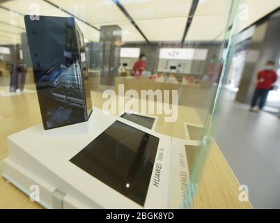 A model of Huawei Mate Xs, a 5G phone with 8-inch foldable screen and Fullview Display developed by Chinese multinational technology company Huawei, i Stock Photo