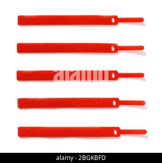 red velcro cable ties on white background Stock Photo