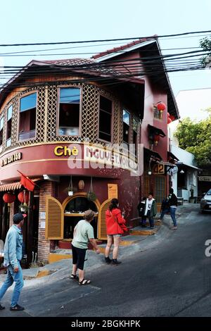 vintage architecture sweet soup restaurant, famous place to check in when travel this city, beautiful architect in brown color at bend of slope street Stock Photo