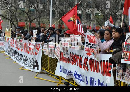 Toronto, Ontario, Canada - 05/01/2009: Protesters holding banners and placard against the Sri Lanka government on the issues on Tamils Stock Photo