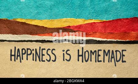 happiness is homemade inspirational note - handwriting on a handmade bark paper, positivity and personal development concept Stock Photo