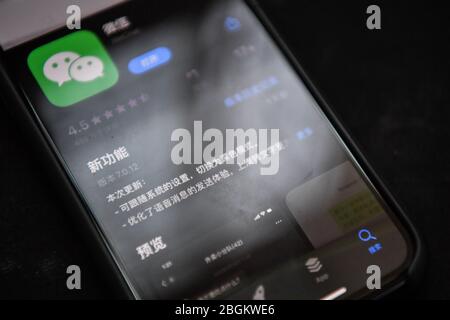 In this unlocated photo, the App pf WeChat in dark mode is shown on an ...