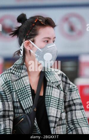 Chinese actress Zhang Yuxi arrives at a Beijing airport before ...