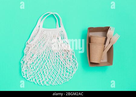 https://l450v.alamy.com/450v/2bgm2ac/natural-eco-friendly-disposable-utensils-and-mesh-textile-bag-2bgm2ac.jpg