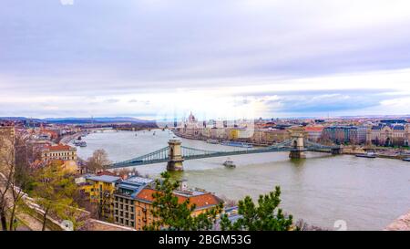 View of Chain Bridge, Hungarian Parliament and River Danube form Castle Garden Bazaar, Budapest Hungary. Stock Photo