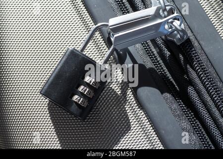 small Luggage lock, magnetic closure combinations, safety on the road, macro close-up Stock Photo