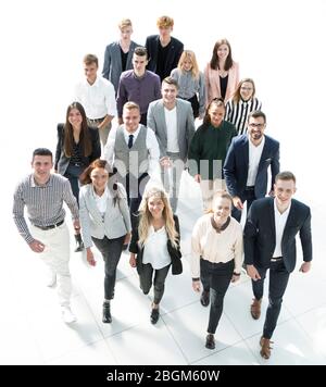 group of diverse young business people walking together Stock Photo