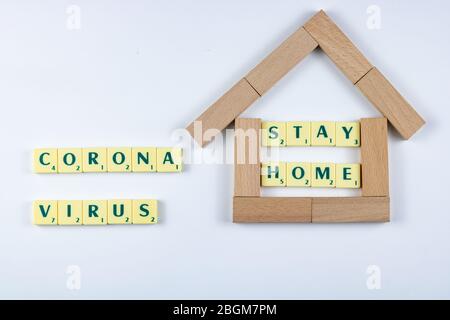 writing with word game letters 'Stay Home' for be safe to corona virus Stock Photo