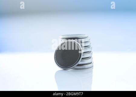 Miniature battery button cell. with chemical data. Stock Photo