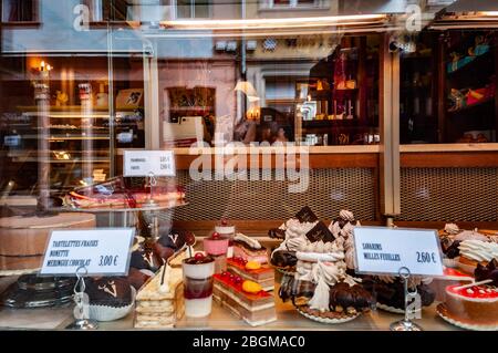 Wissembourg, France. September 13th, 2009. Succulent delicacies in a pastry shop window. Stock Photo