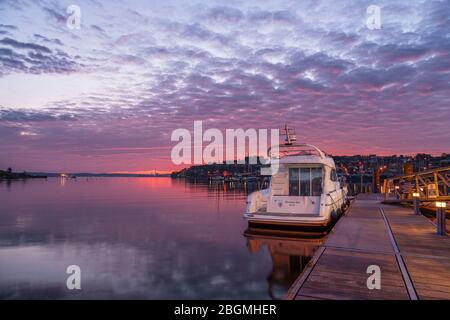 Crosshaven, Cork, Ireland. 22nd April, 2020. Motor boat Morning Star berthed at the Hugh Coveney Pier before dawn at the picturesque village of Crosshaven, Co. Cork, Ireland. - Credit; David Creedon / Alamy Live News Stock Photo