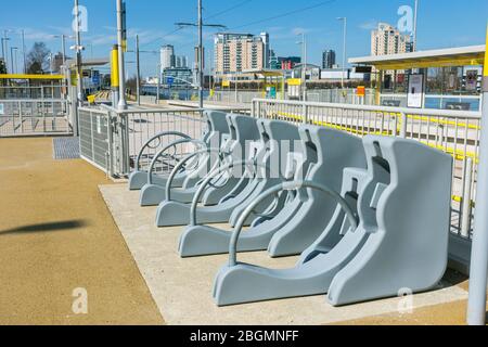 Cycle racks at the Wharfside tram stop on the Trafford Park Line, Wharfside, Old Trafford, Manchester, UK Stock Photo