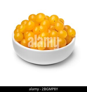 Bowl with fresh yellow Tomberry tomatoes isolated on white background Stock Photo