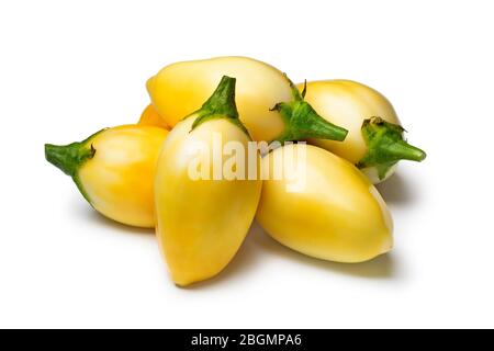 Fresh whole yellow mini eggplants close up isolated on white background Stock Photo