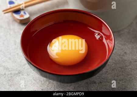 Japanese fresh raw egg in a bowl close up Stock Photo