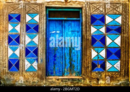 vintage rustic door with geometrical elements. retro background. Stock Photo