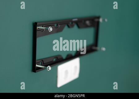 repair and decoration. wall mount for tv. Stock Photo