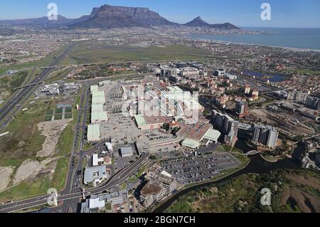 Aerial photo of Century City and N1 highway with Table Mountain and Cape Town CBD in the background Stock Photo