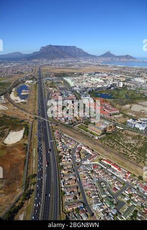 Aerial photo of Century City and N1 highway with Table Mountain and Cape Town CBD in the background Stock Photo