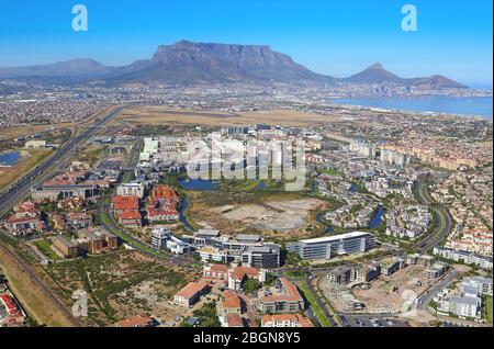 Aerial photo of Century City and N1 highway with Table Mountain and Cape Town CBD in the background Stock Photo