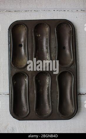 Different types of baking pans and moulds for cake, bread and muffins. Stock Photo