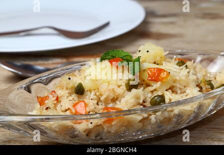 indian rice dish or veg biryani, veg pulav, Indian vegetable pulao in a glass bowl. Stock Photo