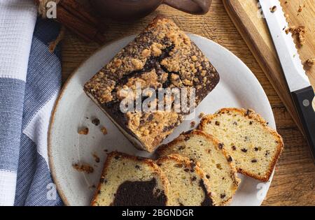 Top view of sliced chocolate marble loaf cake on a plate Stock Photo