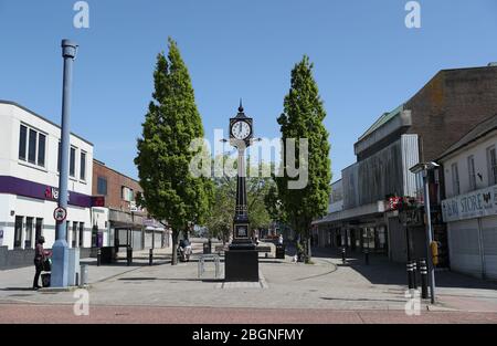 PA asked its photographers to take one picture at NOON to show the impact of coronavirus on the UK and Ireland. A view of a near-deserted Waterlooville town centre in Hampshire as shops and business remain closed and the population in lockdown in the continuing fight against the coronavirus. Stock Photo