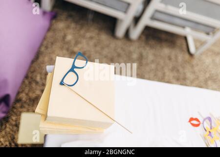 Photo booth accessories. Blue glasses on a stick Stock Photo