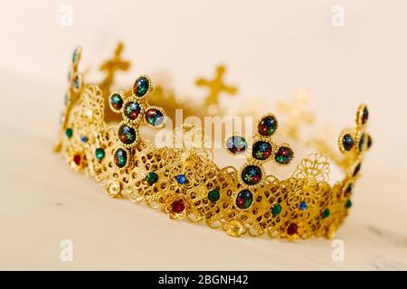 Golden crown encrusted with precious stones and crosses Stock Photo