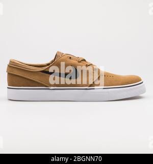 Nike stefan janoski golden beige best sale