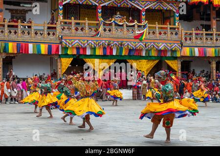 Bhutan, Punakha Dzong. Punakha Drubchen Festival, masked dancers. Stock Photo