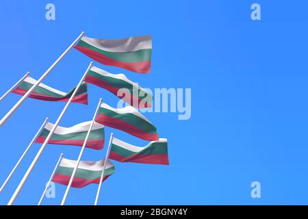 Bulgaria flags waving in the wind against a blue sky. 3D Rendering Stock Photo