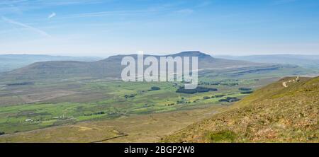 Panoramic view of Ingleborough, one of the Yorkshire Three Peaks seen from the summit of Whernside Stock Photo