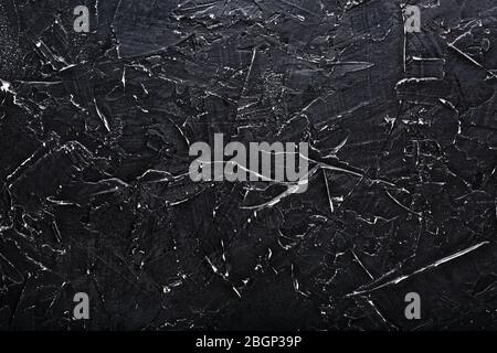 Black Stone texture wall background with white scratches. Stock Photo