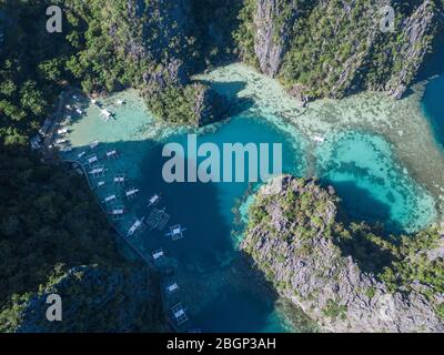 Aerial of magnificent Coron island lagoon, turquoise clear water and breathtaking views. Stock Photo